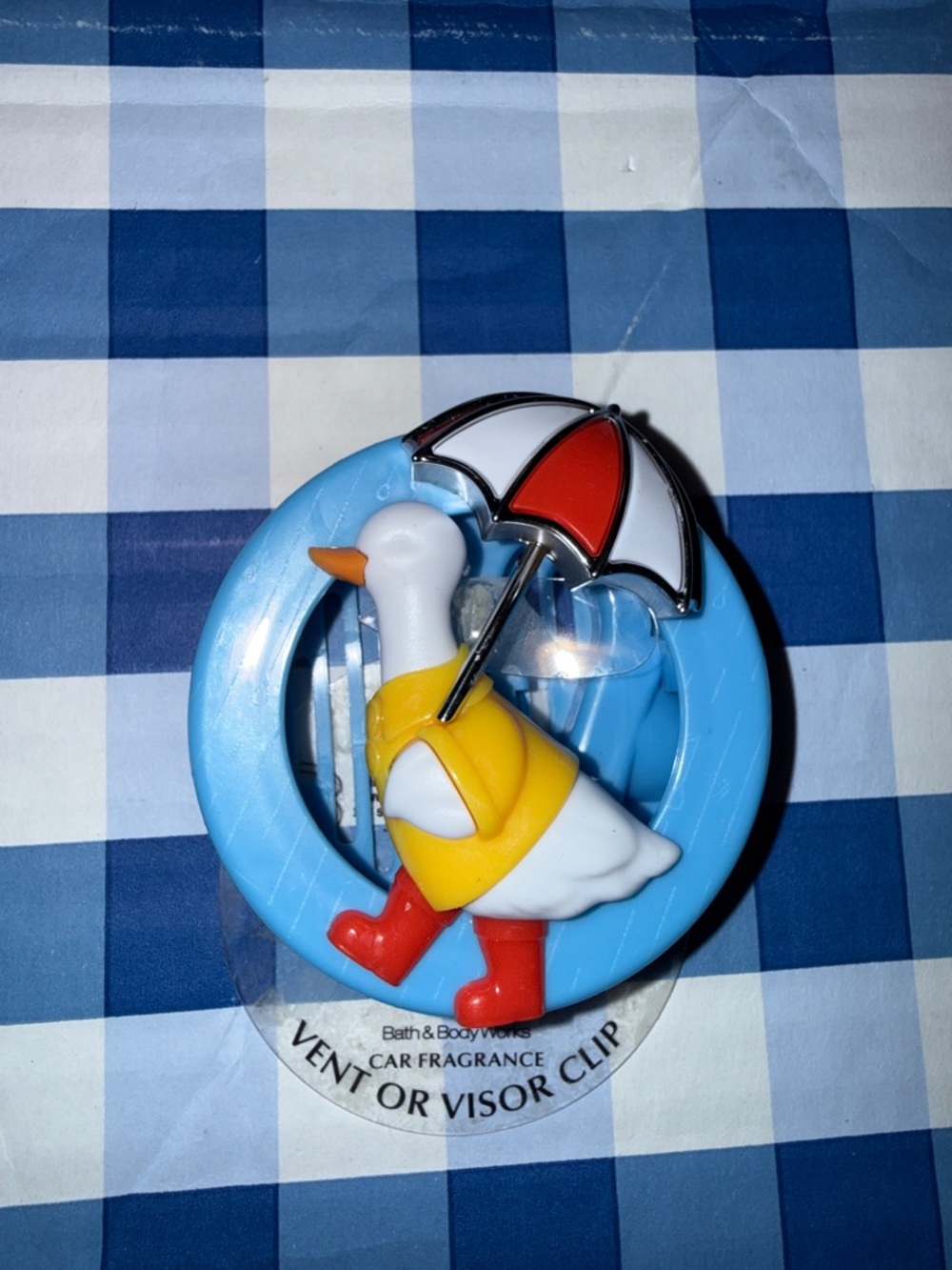 Goose with umbrella, car visor, and vent clip